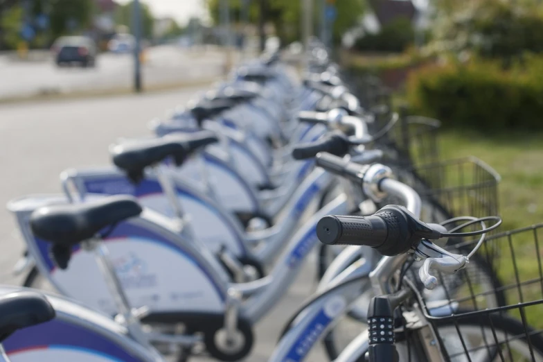 a row of bicycles parked next to each other, happening, avatar image, upclose, helmond, abcdefghijklmnopqrstuvwxyz