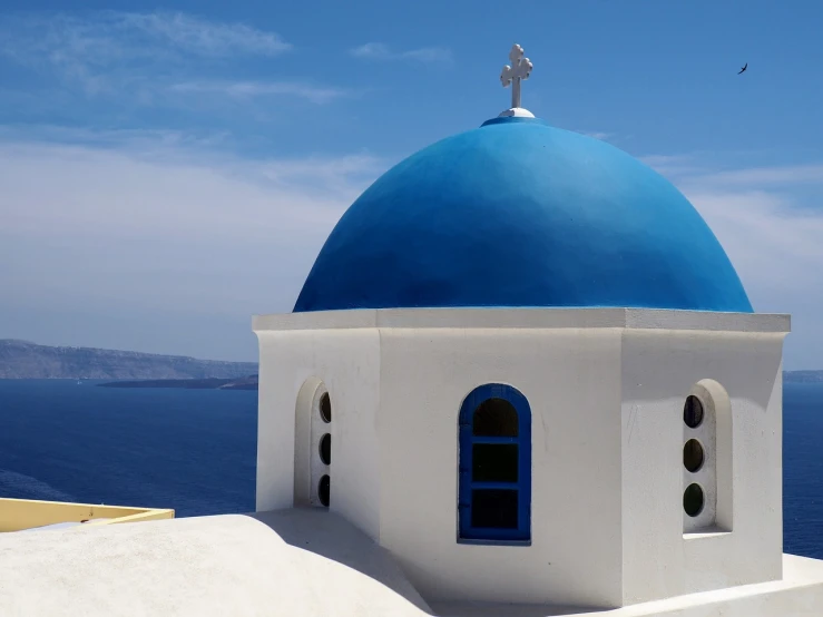 a blue dome on top of a white building, inspired by Theophanes the Greek, there is a window to the sea, an olive skinned, cherry, prayer