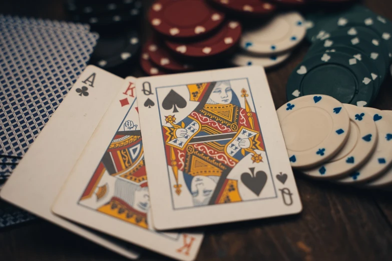 a pile of playing cards sitting on top of a table, a picture, by Daniel Seghers, pexels contest winner, poker face, pair of keycards on table, 🦩🪐🐞👩🏻🦳, high delicate details