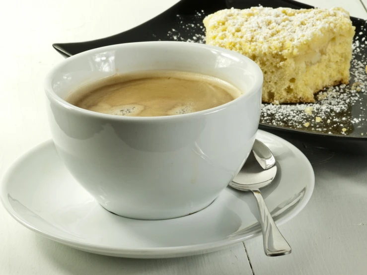 a cup of coffee with a piece of cake in the background, by John Murdoch, high quality product image”, square, light cream and white colors, powdered sugar
