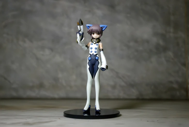a close up of a figurine of a person holding a knife, by senior character artist, polycount, shin hanga, fully robotic!! catgirl, fullbody photo, close up of lain iwakura, with pistol