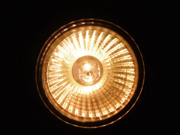 a close up of a light in a dark room, by Jan Rustem, flickr, symmetrical rim light, halogen, light tan, light bulb