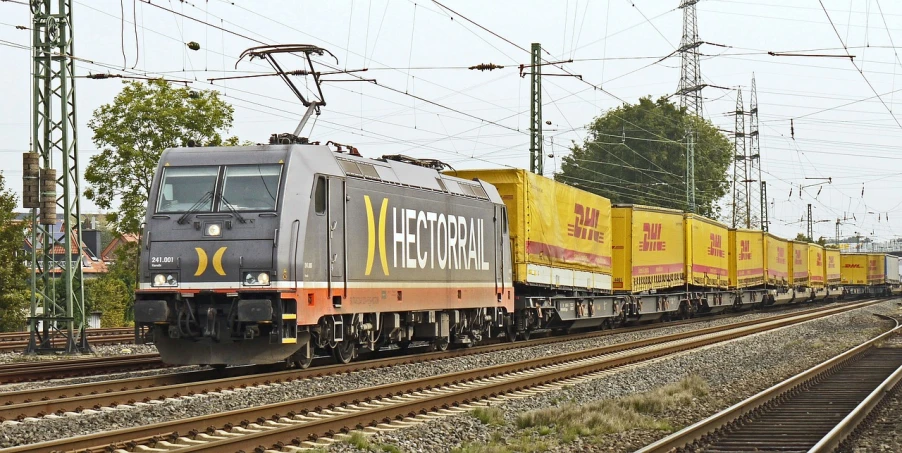 a large long train on a steel track, by Werner Gutzeit, flickr, hexagonal shaped, vecna, gtr xu1, very tasty