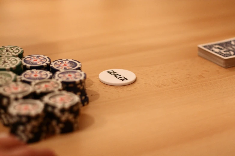a pile of poker chips sitting on top of a wooden table, by Mathias Kollros, flickr, badge on collar, healer, detail on scene, fuller