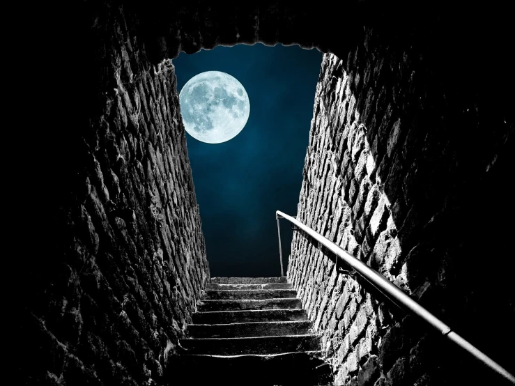 a black and white photo of stairs leading to a full moon, shutterstock, dungeon, blue moonlight, stock photo, narrow passage