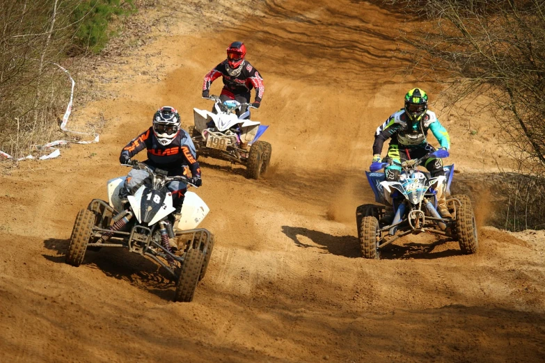 a couple of people riding atvs down a dirt road, shutterstock, figuration libre, in a race competition, museum quality photo, 4k-, 8k octan photo