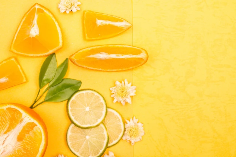 sliced oranges, limes, and flowers on a yellow background, a picture, by Amédée Ozenfant, shutterstock contest winner, process art, juice, 🤬 🤮 💕 🎀, background bar, !!beautiful!!