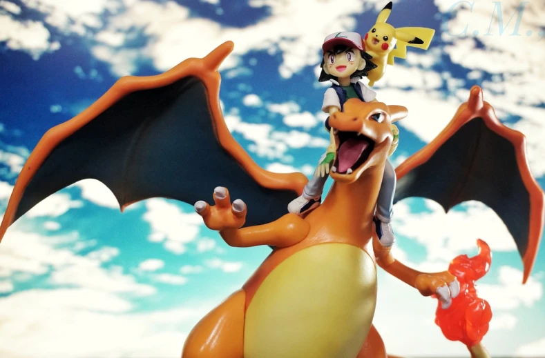 a close up of a figurine of a dragon, a picture, by Tadashi Nakayama, trending on polycount, digital art, pikachu as jesus, teenage girl riding a dragon, real life charmander, ash ketchum