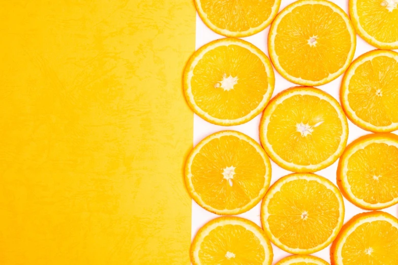 a bunch of oranges sitting on top of a table, a stock photo, minimalism, 🍸🍋, bright yellow color scheme, dividing it into nine quarters, close-up product photo
