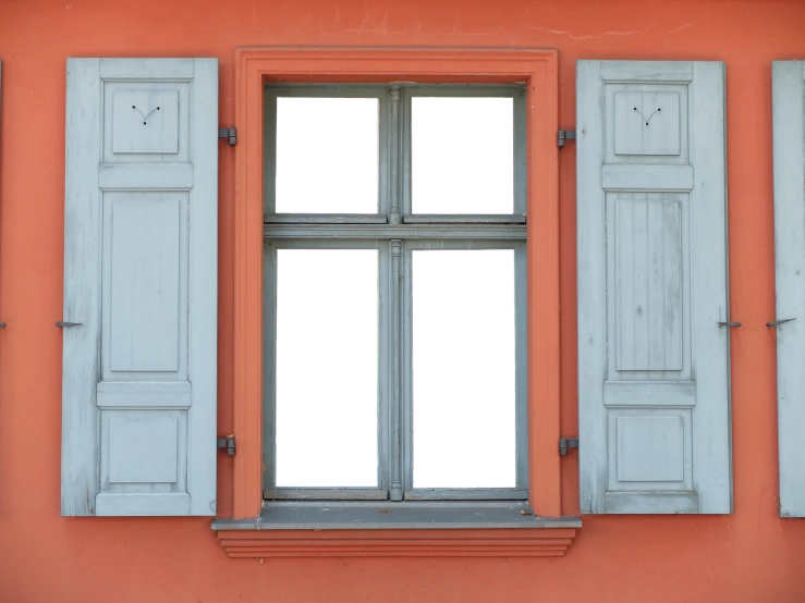 a close up of a window with shutters open, inspired by Jan Kupecký, shutterstock, renaissance, orange and black, demolition, front photo, location of a dark old house