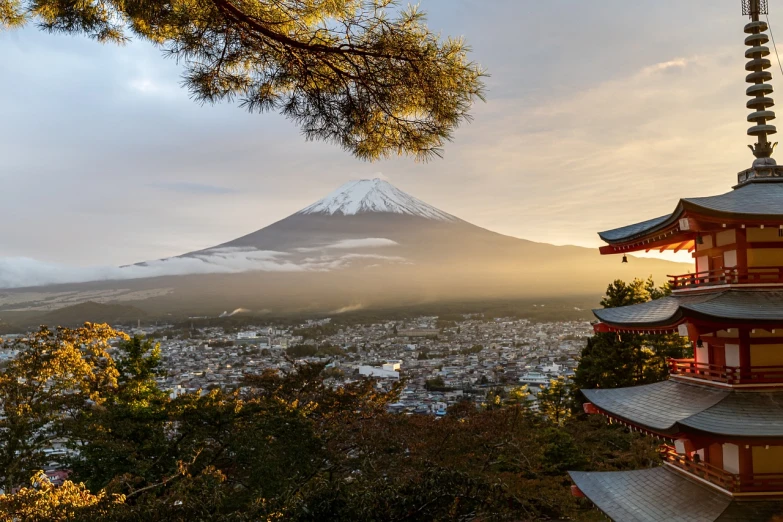 a pagoda with a mountain in the background, a picture, shutterstock, 4k vertical wallpaper, japanese town, fuji choco, national geographic photo