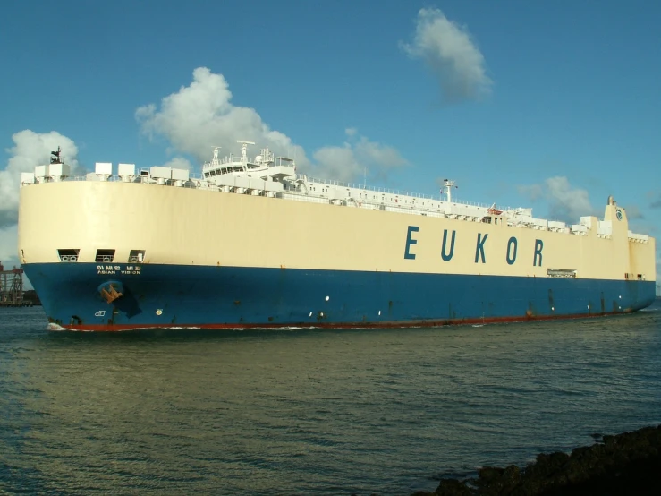 a large boat floating on top of a body of water, by Ella Guru, flickr, bauhaus, container ship, yukio - e, azores, truck