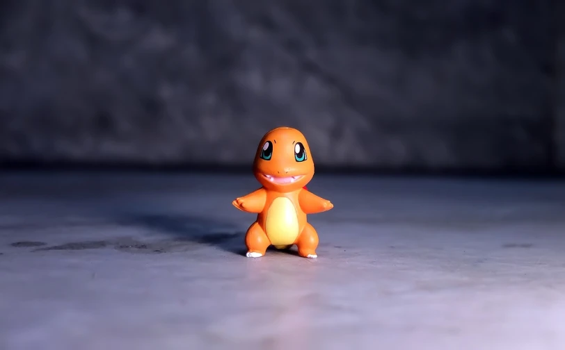a close up of a small toy on a table, inspired by Michaelangelo, trending on polycount, digital art, real life charmander, pokemon trading card game, bw 3 d render, full body wide shot