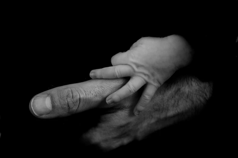 a close up of a person holding a baby's hand, a black and white photo, by Mirko Rački, romanticism, pudica gesture bouguereau style, hans bellmer and nadav kander, 30 year old man, img _ 9 7 5. raw