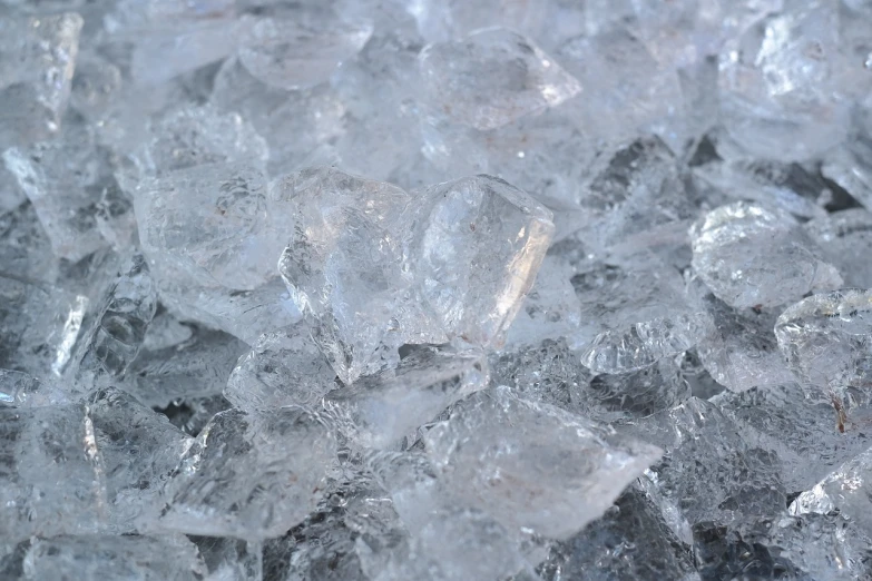 a pile of ice sitting on top of a table, a macro photograph, high detail product photo