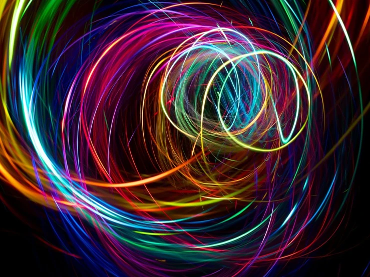 a colorful swirl of light on a black background, digital art, inspired by Lorentz Frölich, neon wires, colorful”