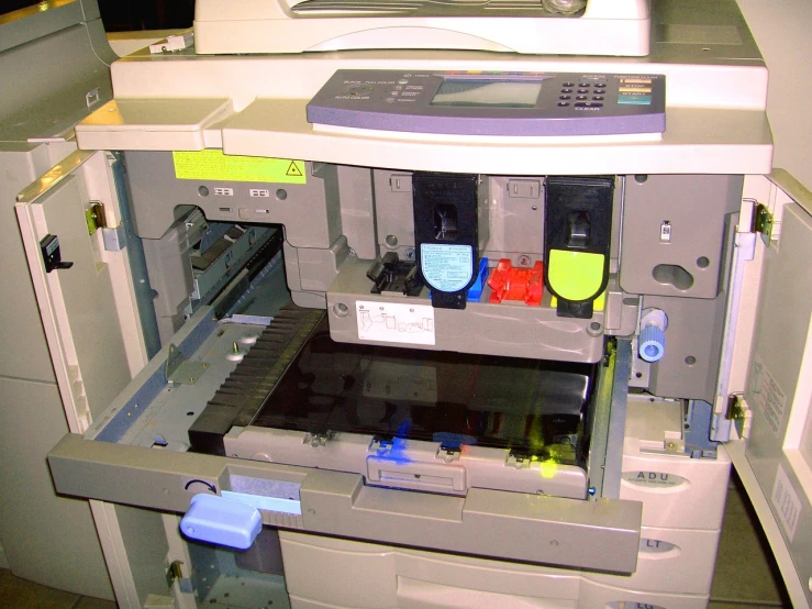 a printer that is sitting inside of a cabinet, a photocopy, flickr