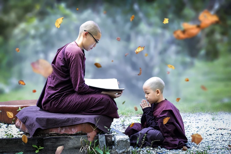 a man sitting on a bench next to a little boy, a picture, by Li Mei-shu, trending on pixabay, minimalism, saggy purple robes, dramatic reading spell book pose, buddhist monk meditating, autumn