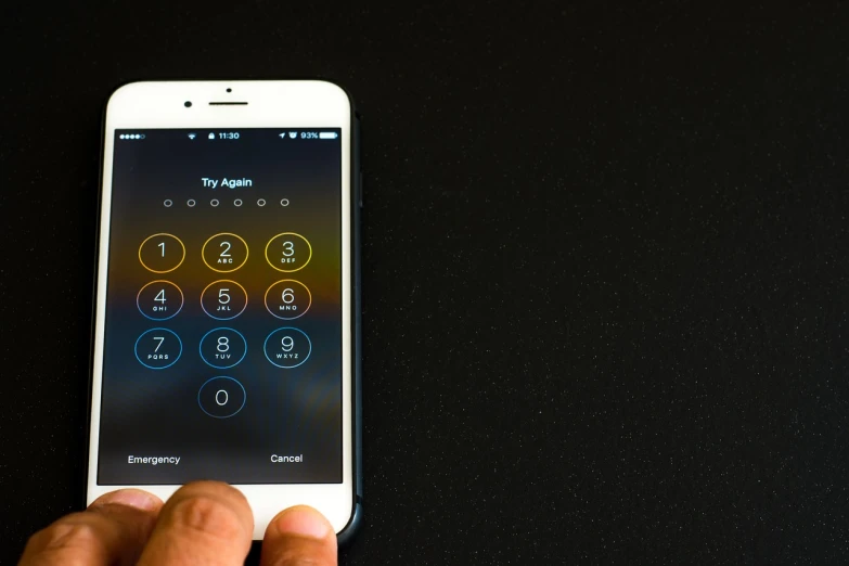 a close up of a person holding a cell phone, a stock photo, by Joseph Pisani, shutterstock, happening, lock, iphone background, on a black background, with apple