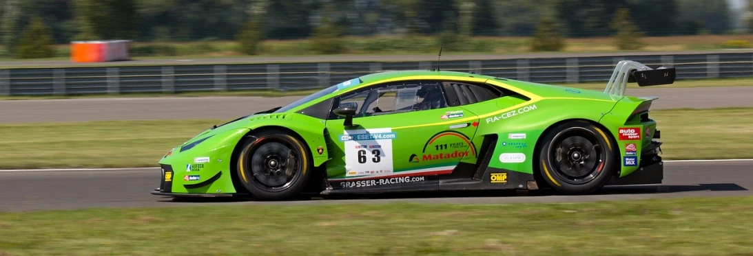 a green sports car driving on a race track, a photo, pixabay, renaissance, lamborghini, full-body-shot, side angle, markus gunnar