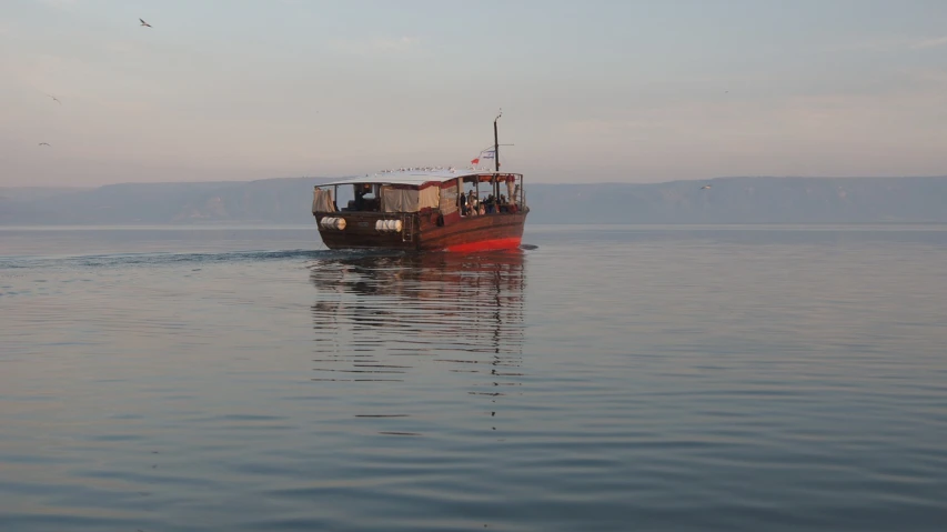 a boat in the middle of a body of water, by Steven Belledin, mingei, the dead sea, sideview, orthodox, summer evening