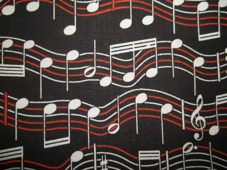 a close up of a tie with musical notes on it, inspired by Kawai Gyokudō, tumblr, sōsaku hanga, dark background ”, red and white and black colors, grain”