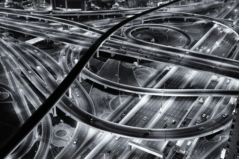 a black and white photo of a highway intersection, by Zha Shibiao, flickr, futurism, dubai, highly detailed composition, postprocessed, above view