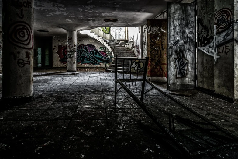 an empty room with graffiti on the walls, graffiti art, by Sebastian Spreng, stairs from hell to heaven, old chairs, mid shot photo, tourist photo