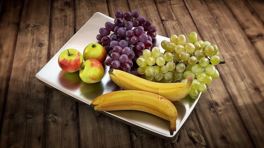 a white plate topped with fruit on top of a wooden table, a photorealistic painting, by Robert Thomas, pixabay, photorealism, octanerender 3 d, banana, grape, highly detailed product photo