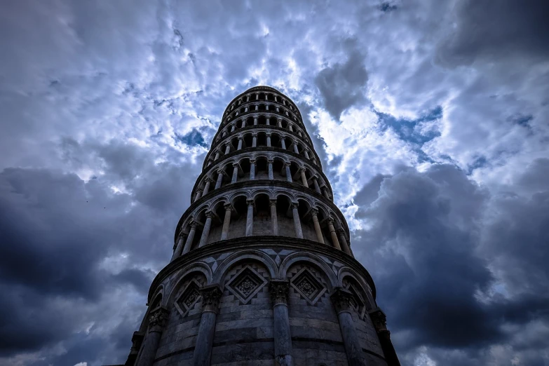 a tall tower sitting under a cloudy sky, a picture, by Bernardino Mei, unsplash contest winner, renaissance, pasta, marble!! (eos 5ds r, wikimedia, ominous evening