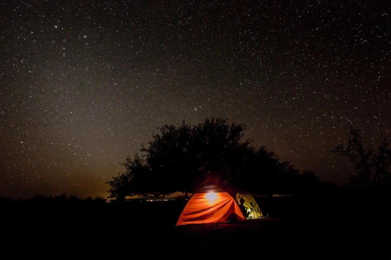 a tent is lit up at night under the stars, a portrait, by Joe Bowler, tx, 2 4 mm iso 8 0 0, wallpaper - 1 0 2 4