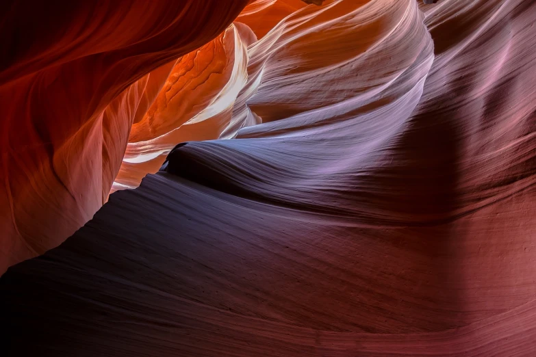 an image of the inside of a canyon, by Andrew Geddes, pexels contest winner, lyrical abstraction, some orange and purple, sand swirling, great light and shadows”, rippling muscles