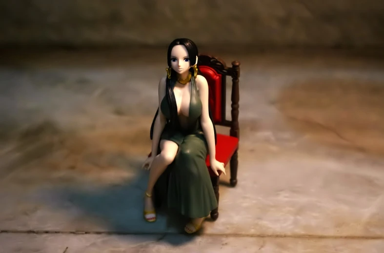 a woman sitting on top of a red chair, a statue, by Hiroyuki Tajima, deviantart, nico robin, full view with focus on subject, she wears a dark green dress, toy photo