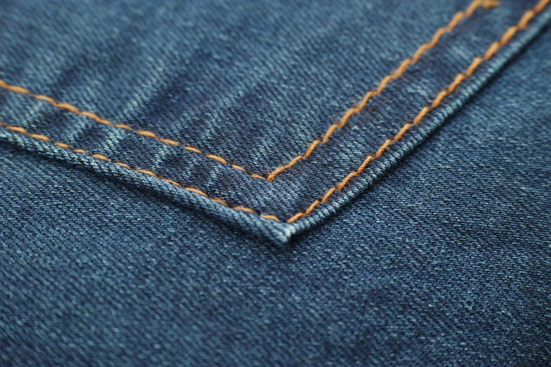 a close up of a pair of blue jeans, a macro photograph, by Johannes Martini, seams, detailed product shot, medium shot angle, highly_detailded