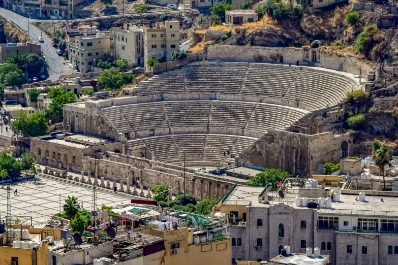 a view of a city from the top of a hill, by Edward Ben Avram, pexels contest winner, neoclassicism, jordan, sportspalast amphitheatre, concert, closeup - view