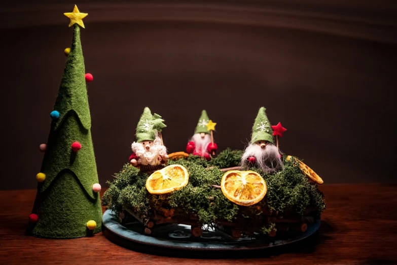 a cake sitting on top of a table next to a christmas tree, inspired by Hendrick Avercamp, three dwarf brothers, 8k 50mm iso 10, kids talking to fruit people, photo taken with nikon d750