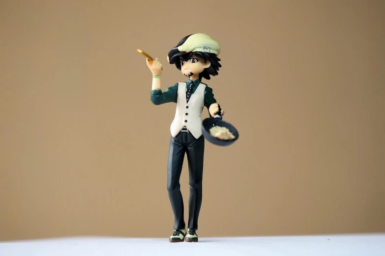 a figurine of a man holding a tennis racquet, a picture, inspired by Junpei Satoh, shin hanga, fullbody photo, the madhatter, animation character, product introduction photo