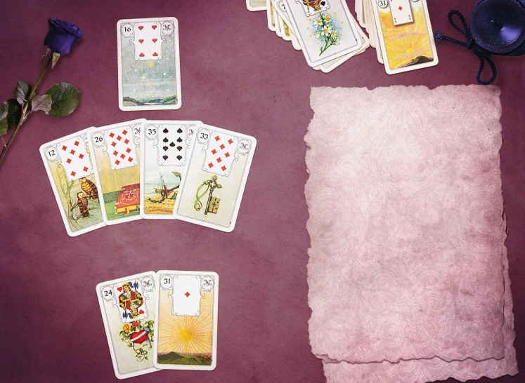 a bunch of cards sitting on top of a table, a screenshot, by Alice Mason, shutterstock, renaissance nimbus overhead, white and pink cloth, violet theme, playing