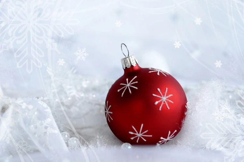 a red ornament sitting on top of snow covered ground, screensaver, with lots of thin ornaments, cute:2, 2 5 6 x 2 5 6