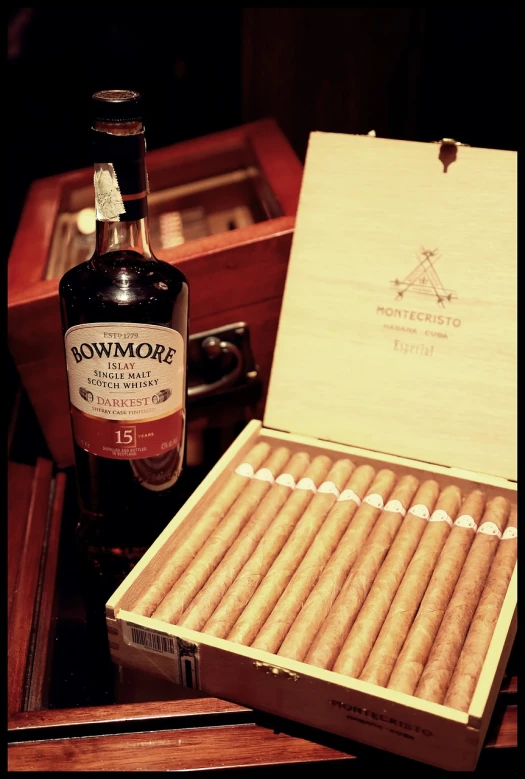 a box of cigars next to a bottle of whiskey, inspired by William Grant Stevenson, the mome raths outgrabe, (((low light))), claymore, wallpaper!