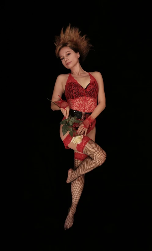 a woman in a red dress holding a rose, inspired by Horst Antes, art nouveau, leotard and leg warmers, photograph taken in 2 0 2 0, wearing fishnets, with professional lighting