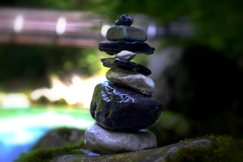 a pile of rocks stacked on top of each other, inspired by Shūbun Tenshō, streams, magic stone, focus stacked, an artistic pose