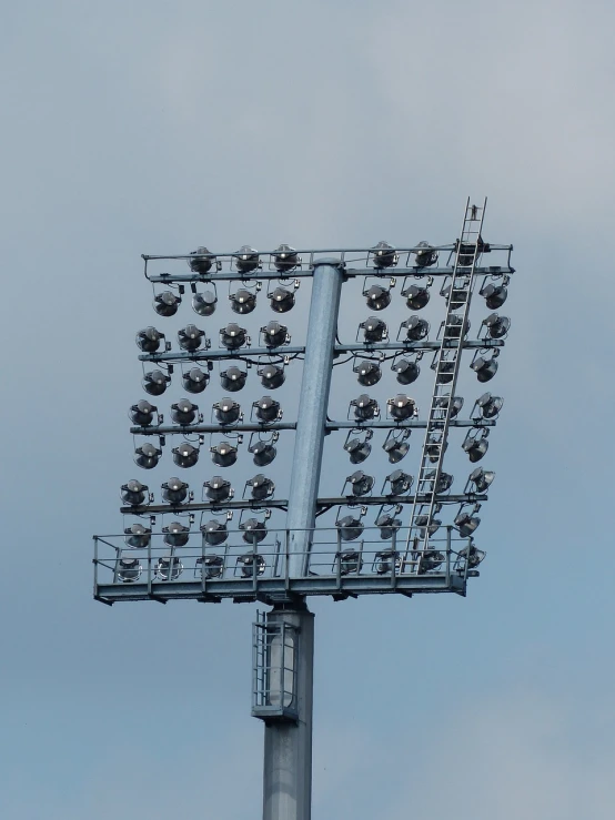 a bunch of lights that are on top of a pole, by Edward Corbett, baseball stadium, tripod, 2 0 0 mm telephoto, osr