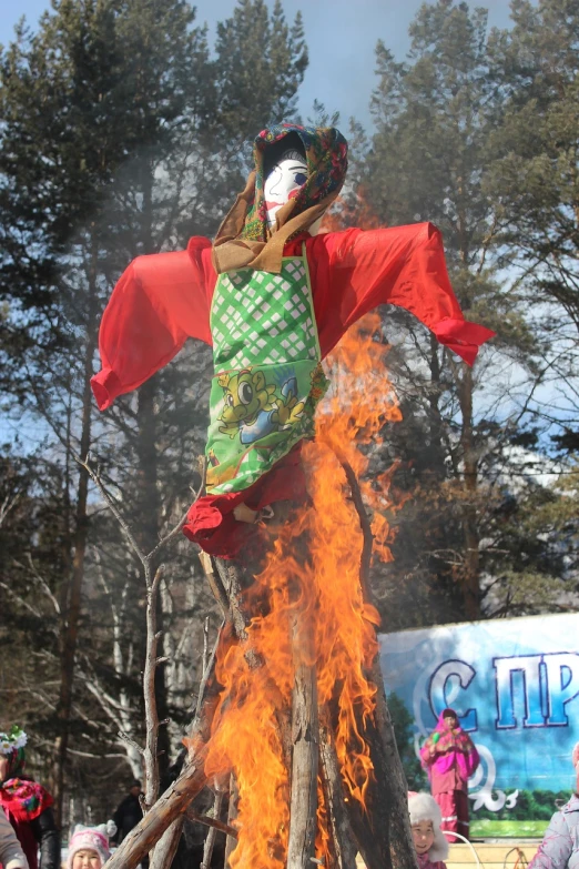 a man that is standing on top of a fire, inspired by Shūbun Tenshō, flickr, figuration libre, on stilts, she is floating in the air, traditional russia, yokai