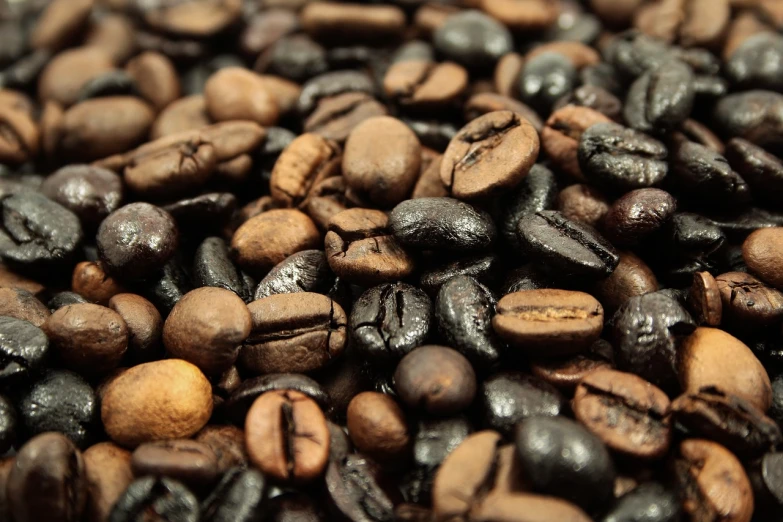a pile of coffee beans sitting on top of each other, renaissance, close-up product photo, black and brown, high detail product photo, full image