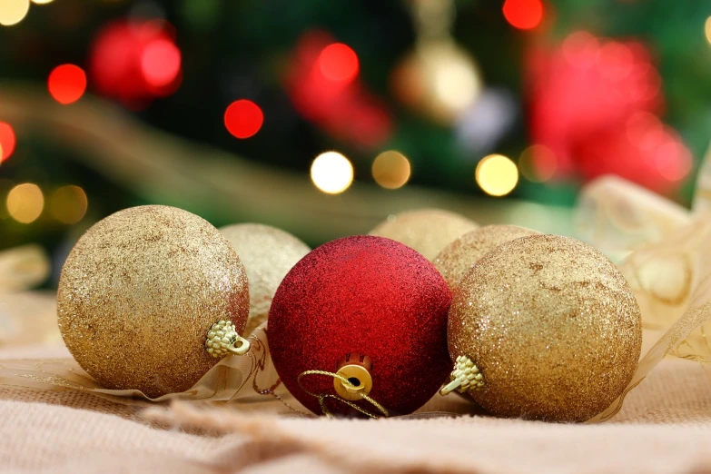 a close up of a red and gold christmas ornament, a picture, incoherents, trio, beautiful wallpaper, ball, profile pic