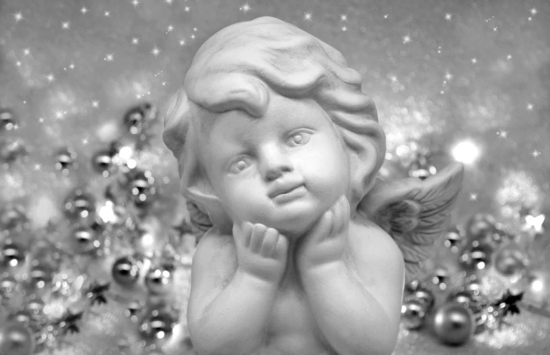 a black and white photo of a statue of an angel, trending on pixabay, glittering silver ornaments, closeup of an adorable, bashful expression, soft vignette