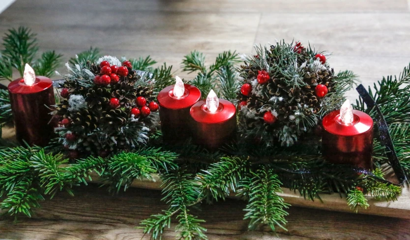 a group of red candles sitting on top of a table, inspired by Ernest William Christmas, with soft bushes, 🕹️ 😎 🔫 🤖 🚬, wood ornaments, - h 1 0 2 4