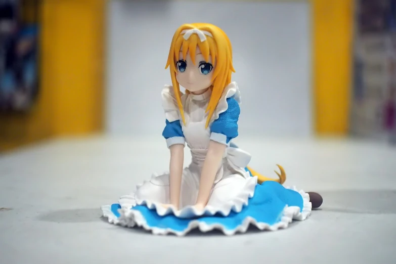 a doll that is sitting on the ground, a statue, by Hiroyuki Tajima, pixiv contest winner, japanese maid cafe, alicization, macro!!!!!!, action figurine toy