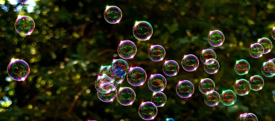 a bunch of soap bubbles floating in the air, by Jan Rustem, pixabay, !!!!!!!!!!!!!!!!!!!!!!!!!, glossy flecks of iridescence, close-up!!!!!!, i_5589.jpeg